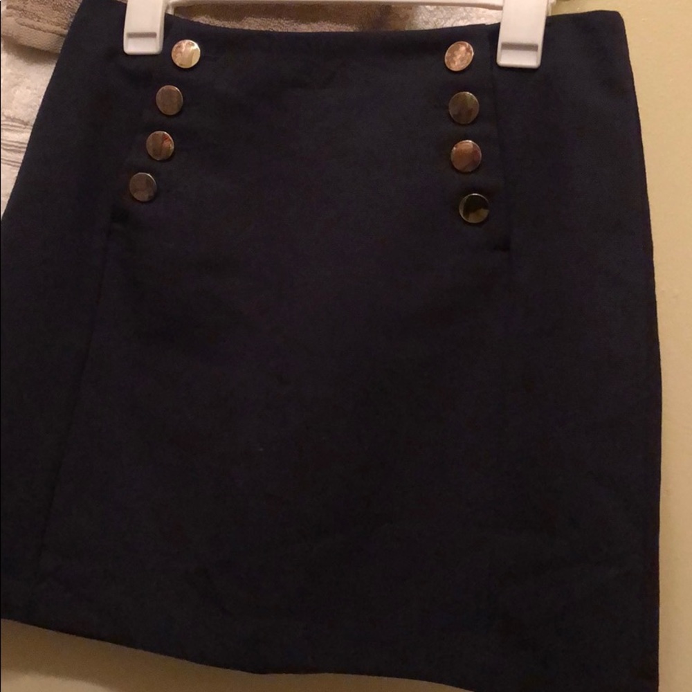 Navy blue skirt. Hardly used. Great for work.